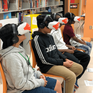 Students watch the 360 film "Generation Ocean: Coral Reefs" to learn how scientists study coral reefs. PC: Angela Rosenberg