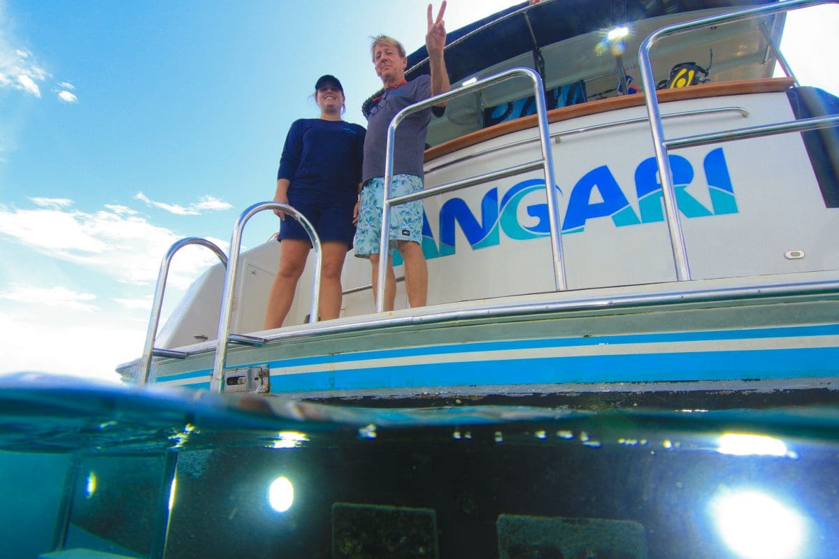 Captain Angela and Kevin on swim platform of R/V ANGARI
