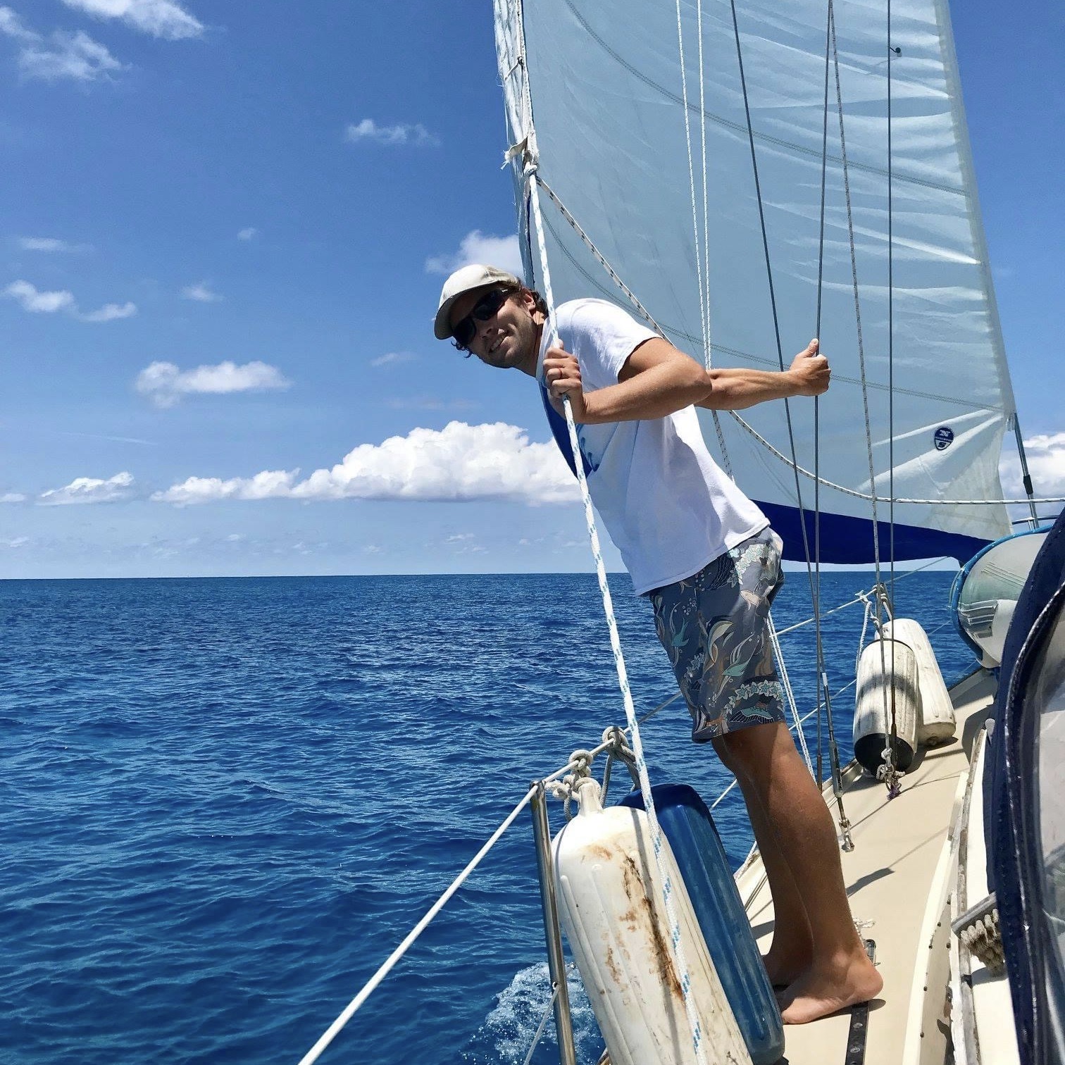 Embracing the ocean breeze while sailing.