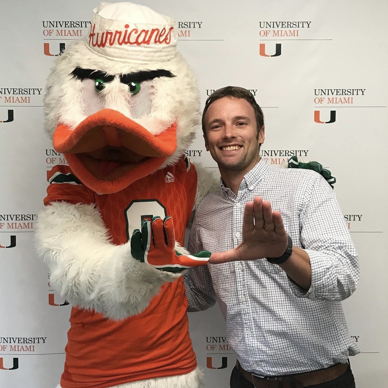 Celebrating the Miami Hurricanes with Sebastian the Ibis, the mascot for the University of Miami.