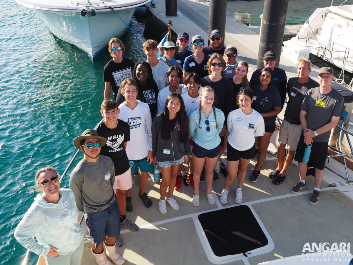EXP 56: Back at the dock, the students, teachers, scientists and crew take a group photo on R/V ANGARI’s bow. PC: Amanda Waite
