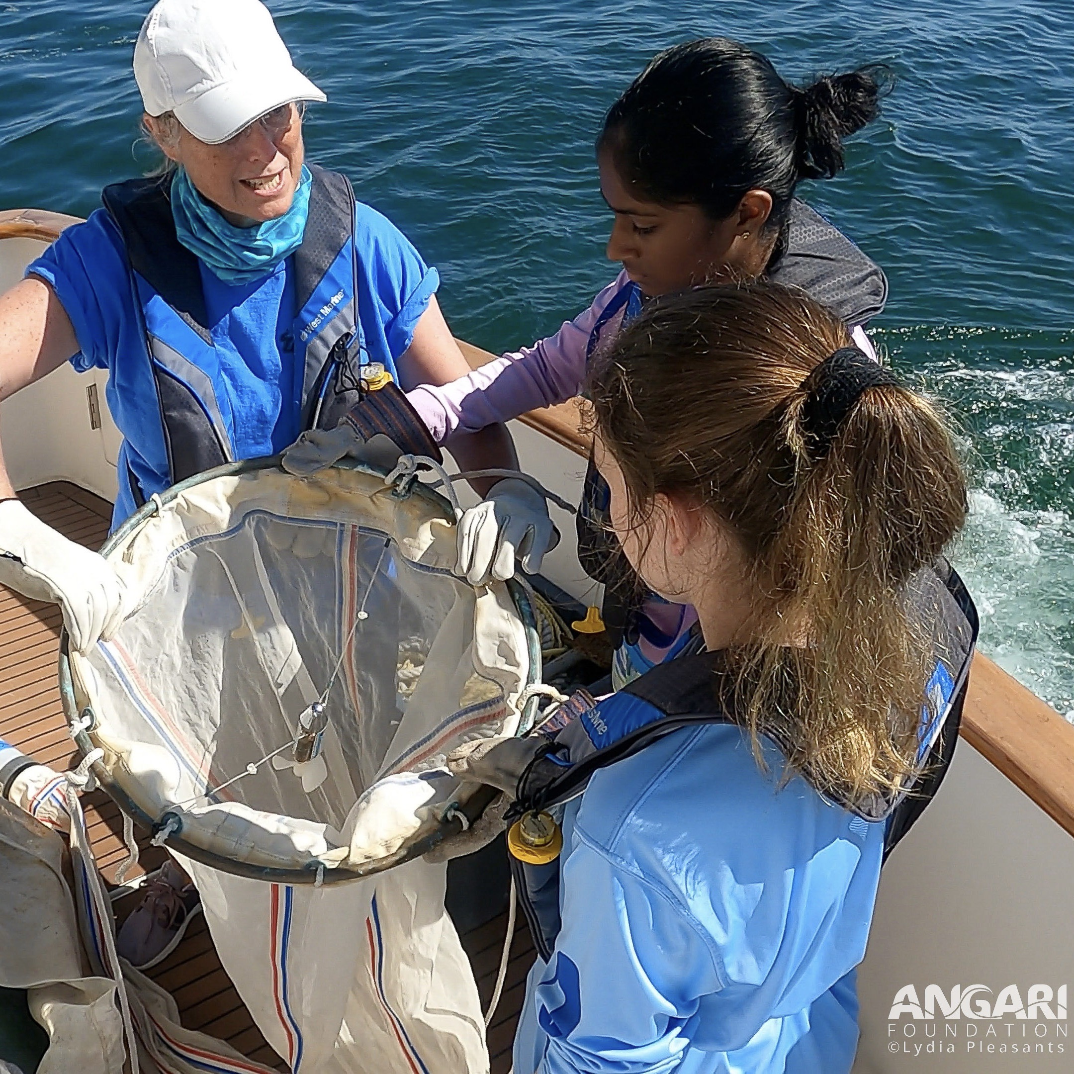 On R/V ANGARI with the Oceanography Camp for Girls preparing to deploy a plankton net to help understand marine plankton, the small and mighty of the ocean!