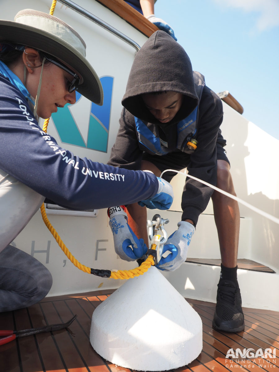 EXP 58: The second step is to attach the monofilament line to the weighted drum. PC: Amanda Waite