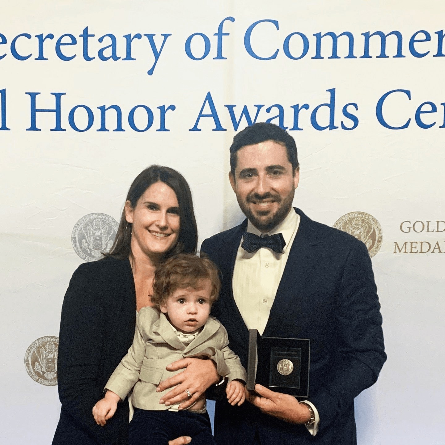 Celebrating with my family after receiving the Department of Commerce Silver Medal.
