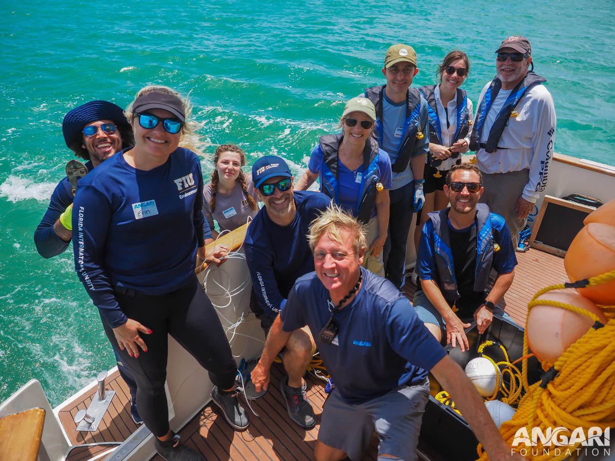 EXP 63: An ecstatic team poses for a picture after a successful shark workup and release. PC: Amanda Waite