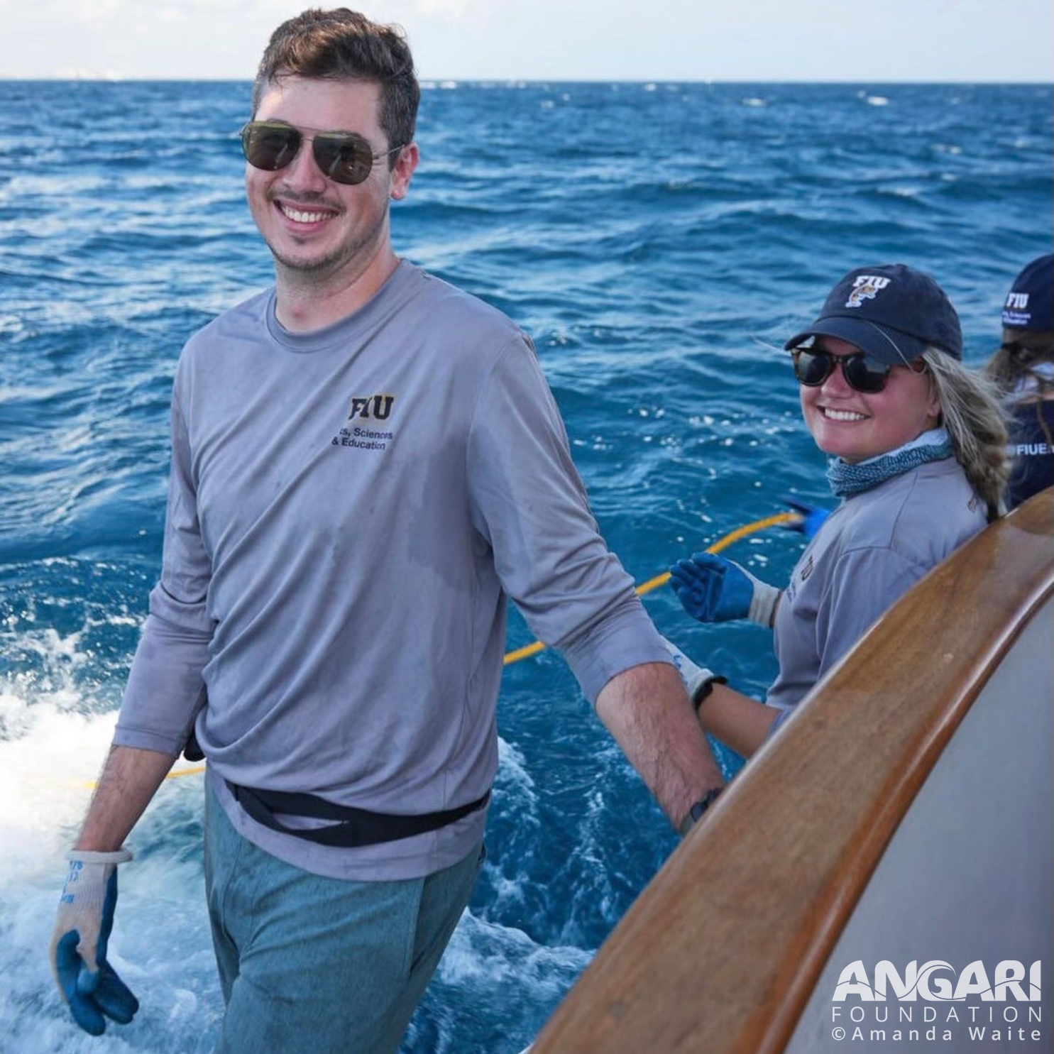 It is all smiles while deploying drum lines from R/V ANGARI as part of the Coastal Ocean Explorers: Sharks program. PC: Amanda Waite