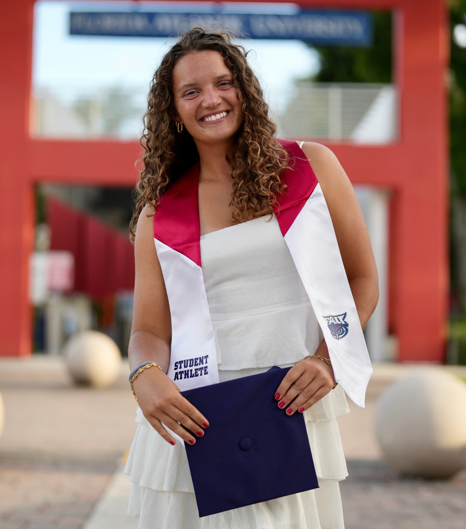 ANGARI Remote Intern Logan Mignerey graduation headshot