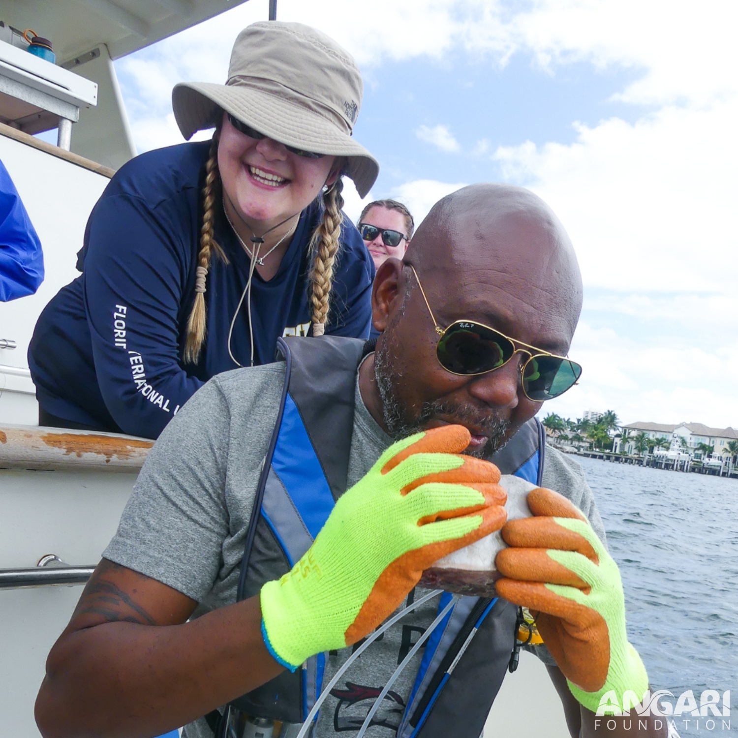 It is all smiles and laughter when we are kissing the bait for good luck onboard R/V ANGARI!