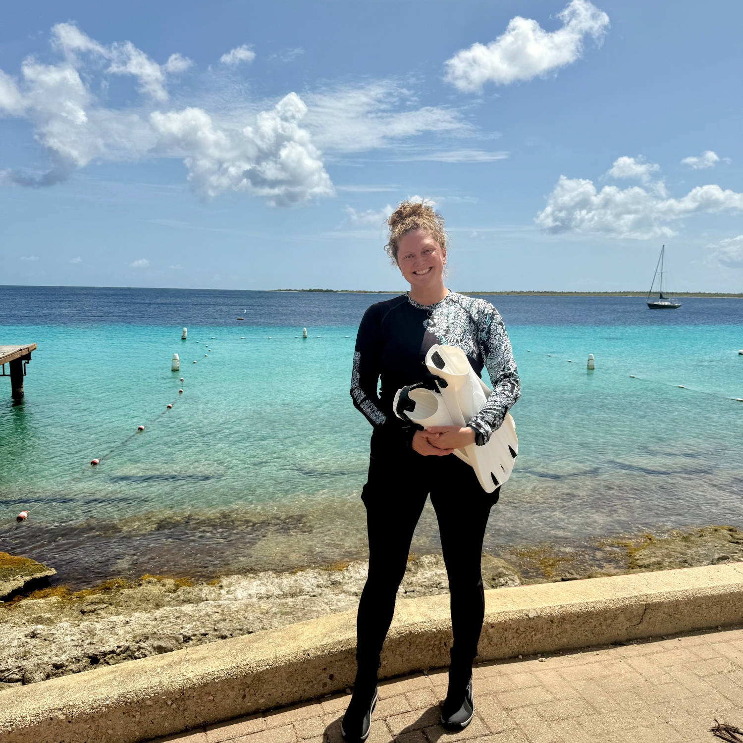 I am all smiles during my PADI SCUBA diving instructor course with Dive Friends Bonaire.